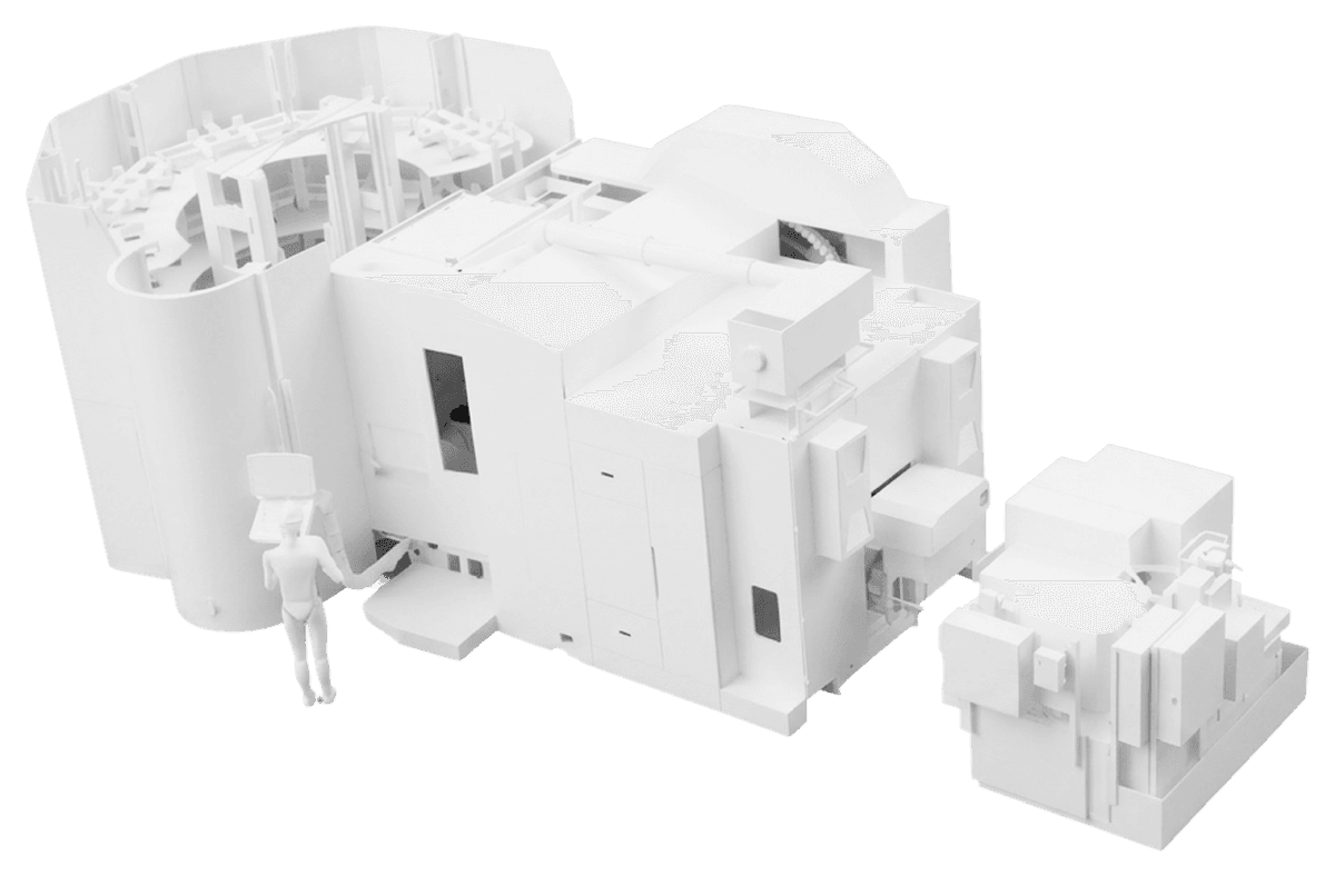 White model of a large CNC machining centre with an operator figure